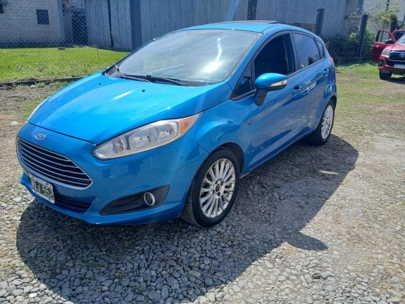 FORD SEDAN 5 PUERTAS FIESTA 1.6L SE PLUS, Año 2014. DOM: NLJ552. Ubicación: San Miguel de Tucumán, provincia de Tucumán