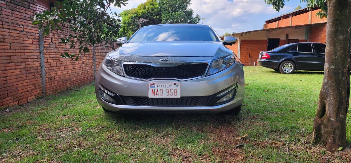 KIA AUTOMOVIL OPTIMA, Año 2012. DOM: NAO958. Ubicación: Fram, Departamento de Itapúa, Paraguay