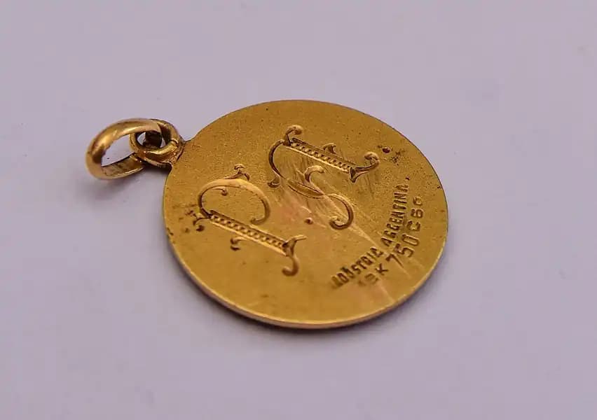 L12 - MEDALLA DE ORO