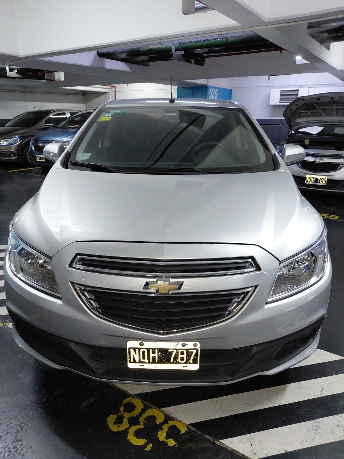 UN AUTOMÓVIL, USADO, FUNCIONANDO, MARCA, MODELO PRISMA 1.4 N LTZ, MOTOR Nº CGZ021776, CHASIS Nº 9BGKT69T0EG212871, TIPO , MODELO AÑO 2014. POSEE: TABLERO DE INSTRUMENTOS, CALEFACTOR, AIRE ACONDICIONADO, PANTALLA TOUCH MULTIFUNCIÓN, ALZA CRISTALES Y ESPEJOS CON COMANDOS ELÉCTRICOS, CIERRE CENTRALIZADO, AIRBAG, CAJA DE VELOCIDADES, DIFERENCIAL, DIRECCIÓN ASISTIDA, Y CINCO RUEDAS ARMADAS CON CUBIERTAS DE USO. CON DETERIOROS GENERALES, PEQUEÑAS AVERÍAS, DESARMES E INCOMPLETO. DOMINIO NQH787.- KM 234907.“EL BANCO NO SE RESPONSABILIZA POR EL KILOMETRAJE REAL DE RODAJE DEL VEHÍCULO ENAJENADO EN SUBASTA”