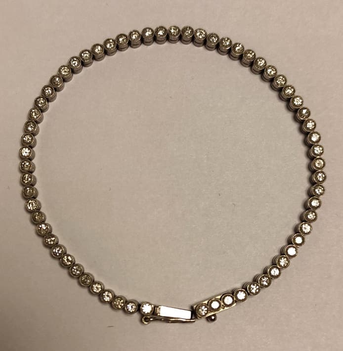 IMPORTANTE PULSERA ARTICULADA REALIZADA EN ORO BLANCO KTE 18 CON BRILLANTES QTE 2,40 TOTAL APROX. (DEFECTOS) . PESO APROX. 13,8 GRS. MEDIDA 18,5 CM. DETERIOROS EN GRAL