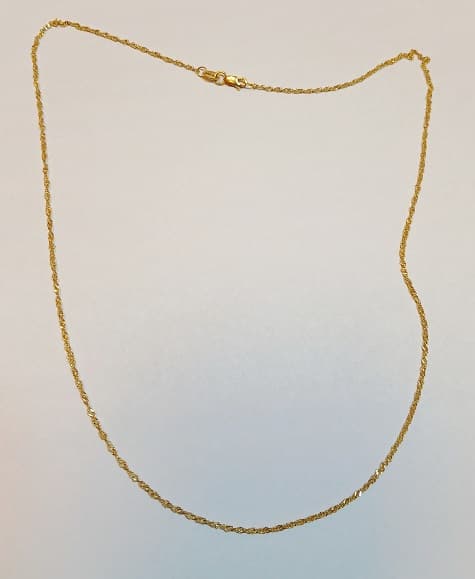 UN COLLAR REALIZADO EN ORO KTE 18 PESO 1.7 GRS MEDIDA 46 CM