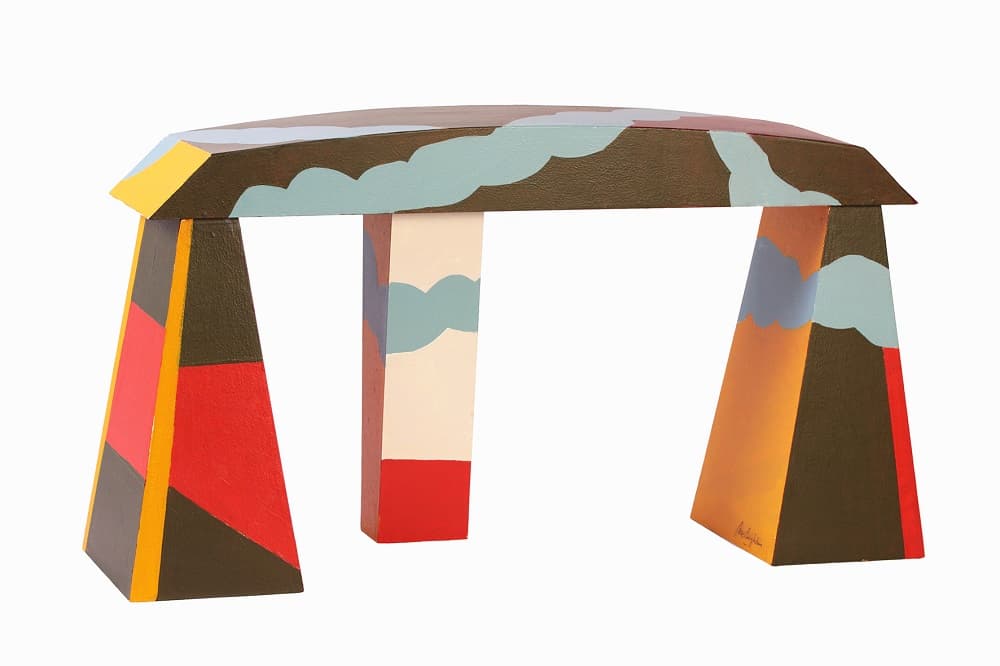 "Elevación del puente- Nube protectora". Escultura. Técnica mixta sobre tabla. Obra de Guillermo Mc Loughlin. Firmada abajo en el pie derecho. Medidas 33 x 60.5 x 16.5 cm. En buen estado. Con pequeños rasponcitos del tiempo sobre los bordes.