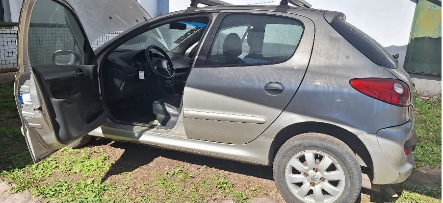 SUBASTA AUTOMOTOR. PEUGEOT 207 COMPAC TXS 1.9. DOMINO IOA880. AÑO 2010.-