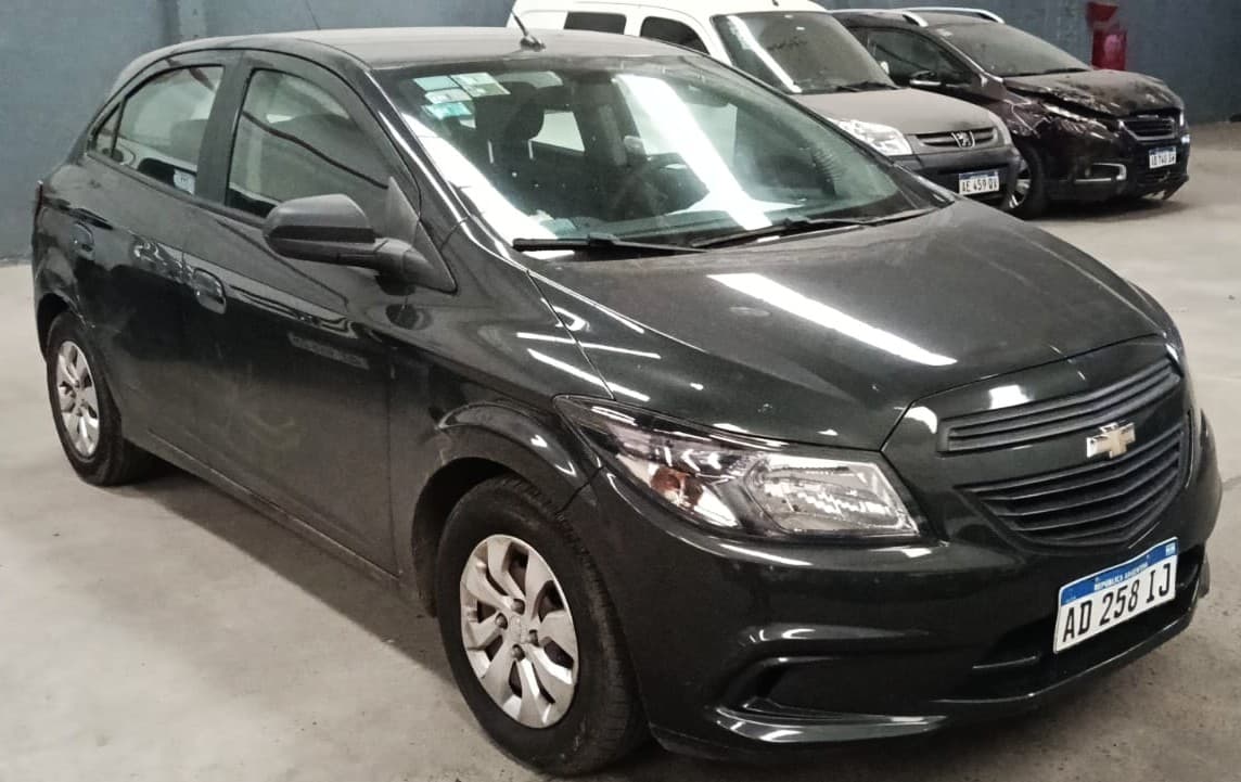 Automotor marca CHEVROLET, Modelo: ONIX JOY 5P 1.4 N LS MT, SEDAN 5 PTAS, 2018. Estado: REGULAR.